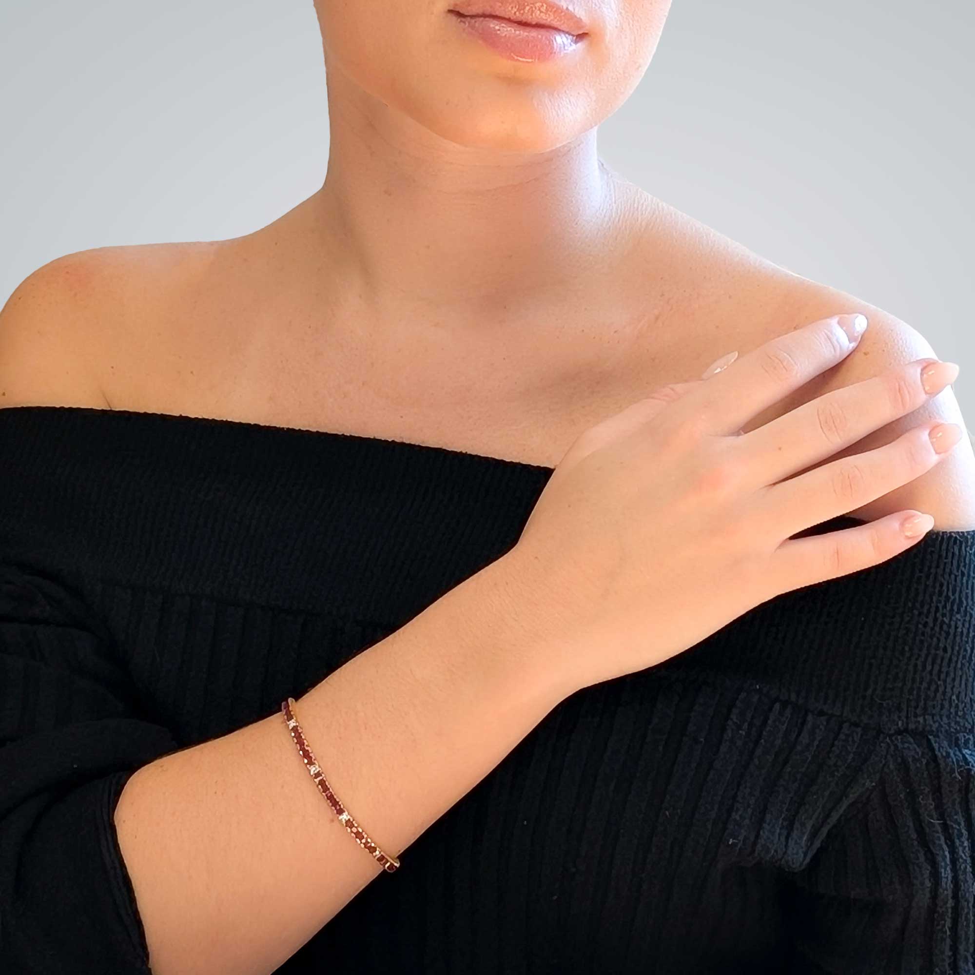 Pulsera Riviere de oro amarillo y con rubíes y princesas
