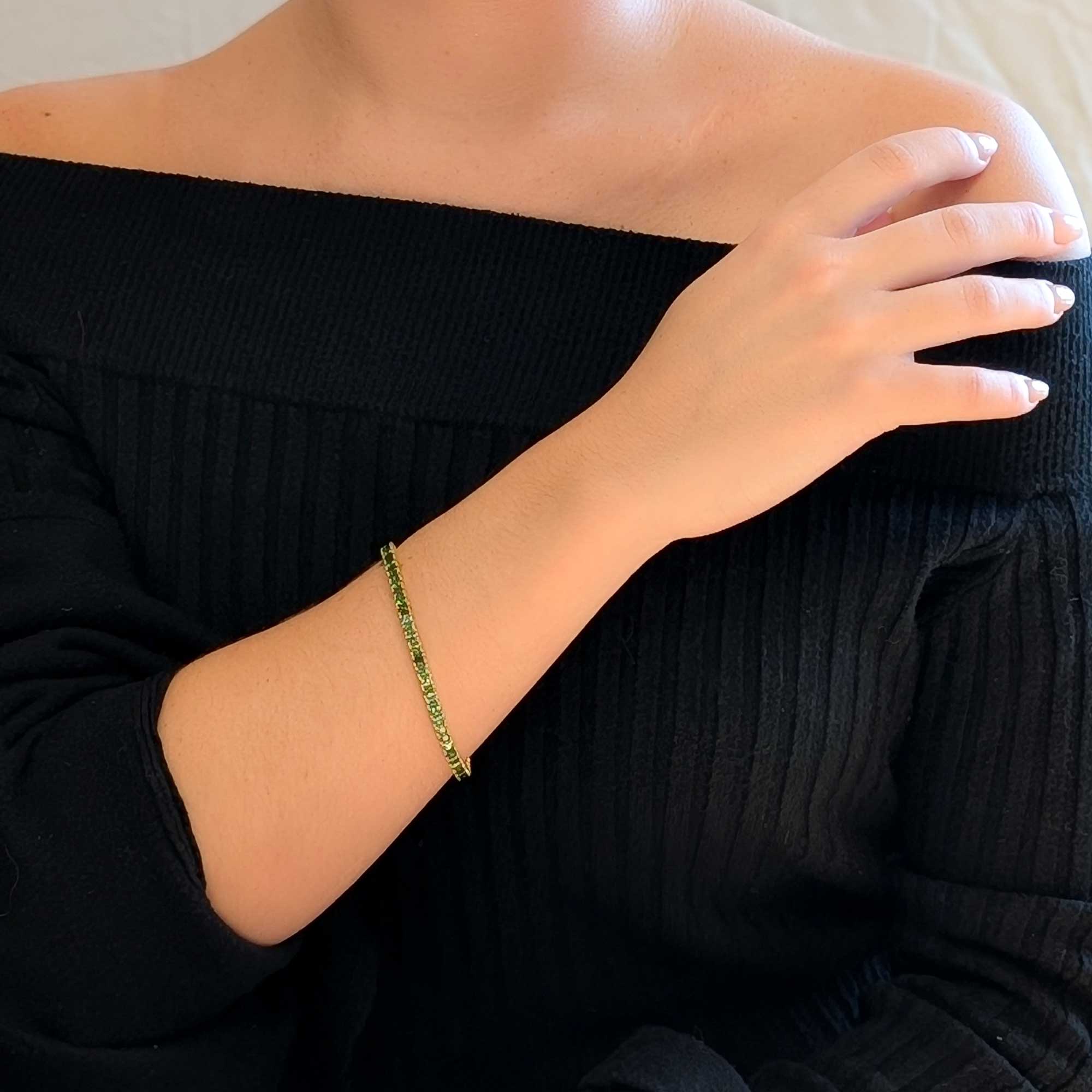 Pulsera Riviere de oro amarillo y tsavoritas