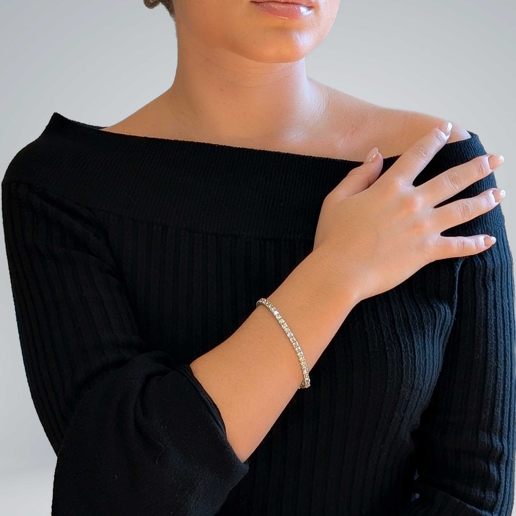 Pulsera riviere de oro blanco y diamantes