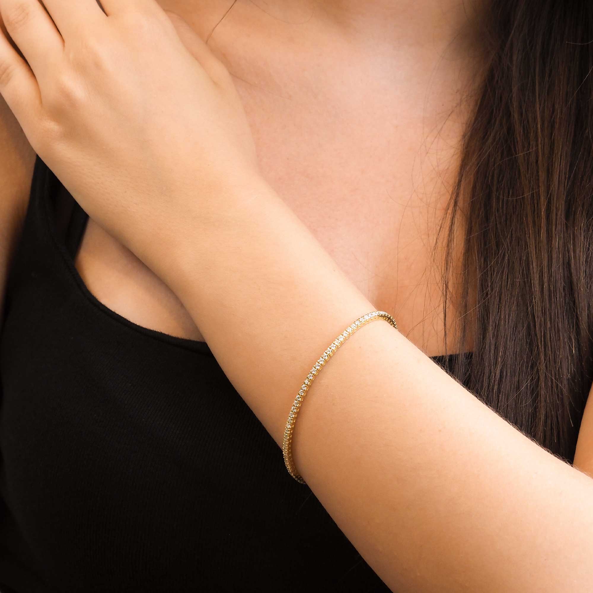 Pulsera Riviere de oro amarillo con diamantes